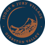 Vibrant ski scene at Judge & Jury Village with skiers enjoying pristine snow slopes and scenic mountain views in New Zealand. Perfect for winter sports enthusiasts.