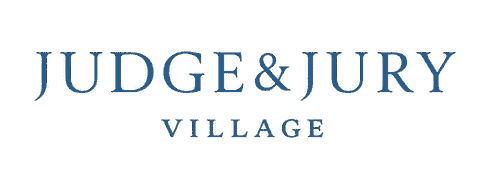 Judges and jury members sitting outdoors at Judge & Jury Village, an event space for legal-themed gatherings and community events in New Zealand.